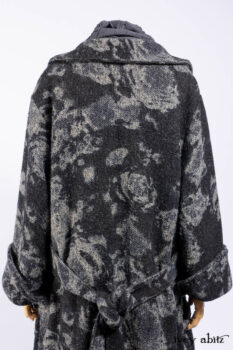 Monceau Duster Coat in Mansard Roof Washed Floral Woolen Weave; Lydia Neck Wrap in Slate Washed Linen; Blanchefleur Dress in Mansard Roof Washed Weave; Cilla Slip Frock in Signature Black Ribbed Knit; Porte Cochere Sash in Mansard Roof Washed Floral Woolen Weave.