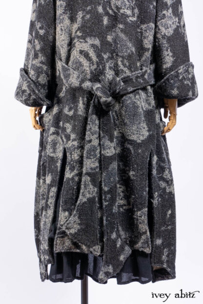 Monceau Duster Coat in Mansard Roof Washed Floral Woolen Weave; Lydia Neck Wrap in Slate Washed Knit; Blanchefleur Dress in Mansard Roof Washed Weave; Cilla Slip Frock in Signature Black Ribbed Knit; Porte Cochere Sash in Mansard Roof Washed Floral Woolen Weave.