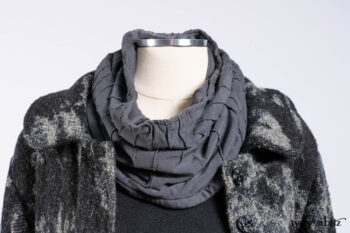 Monceau Duster Coat in Mansard Roof Washed Floral Woolen Weave; Lydia Neck Wrap in Slate Washed Linen; Blanchefleur Dress in Mansard Roof Washed Weave; Cilla Slip Frock in Signature Black Ribbed Knit; Porte Cochere Sash in Mansard Roof Washed Floral Woolen Weave.