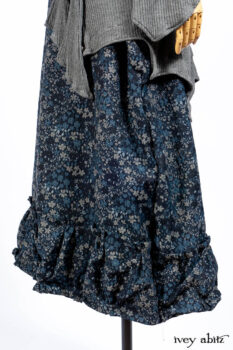 Chittister Shirt Jacket in Slate Ribbed Knit; Lydia Neck Wrap in Slate Washed Knit; Gabled Frock in Hudson River Floral Jacquard; Cilla Slip Frock in Slate Washed Knit.