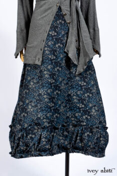 Chittister Shirt Jacket in Slate Ribbed Knit; Lydia Neck Wrap in Slate Washed Knit; Gabled Frock in Hudson River Floral Jacquard; Cilla Slip Frock in Slate Washed Knit.
