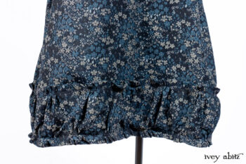 Chittister Shirt Jacket in Slate Ribbed Knit; Lydia Neck Wrap in Slate Washed Knit; Gabled Frock in Hudson River Floral Jacquard; Cilla Slip Frock in Slate Washed Knit.