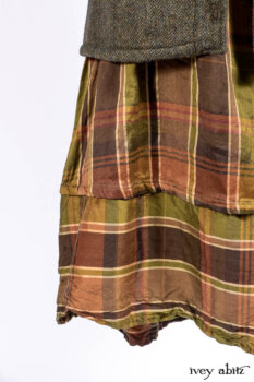 Mathilda Jacket in Central Park Herringbone; Mathilda Shirt in Central Park Washed Stripe Voile; Harrison Frock in Central Park Brownstone Plaid Silk; Cilla Slip Frock in Signature Black Ribbed Knit.