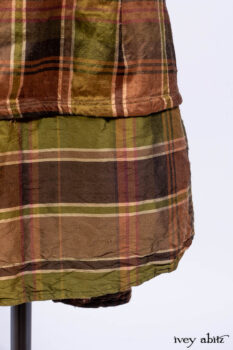 Mathilda Jacket in Central Park Herringbone; Mathilda Shirt in Central Park Washed Stripe Voile; Harrison Frock in Central Park Brownstone Plaid Silk; Cilla Slip Frock in Signature Black Ribbed Knit.