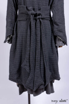 Chittister Duster Coat in Slate Embroidered Windowpane Weave; Chittister Shirt Jacket in Slate Ribbed Knit; Lydia Neck Wrap in Slate Washed Knit; Chittister Frock in Slate and Brownstone Plaid Wool; Elliot Dress in Slate Washed Knit.