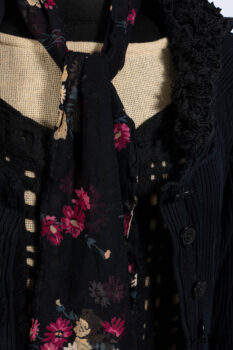Limited Edition Coulson Cardigan in Signature Black Ribbed Knit; Clotaire Sash in Riverside Floral Silk Chiffon; Bedloe Frock in Mansard Roof Open Woolen Weave; Everett Frock in Uptown Washed Weave.