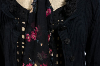 Limited Edition Coulson Cardigan in Signature Black Ribbed Knit; Clotaire Sash in Riverside Floral Silk Chiffon; Bedloe Frock in Mansard Roof Open Woolen Weave; Everett Frock in Uptown Washed Weave.