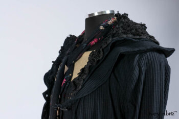 Limited Edition Coulson Cardigan in Signature Black Ribbed Knit; Clotaire Sash in Riverside Floral Silk Chiffon; Bedloe Frock in Mansard Roof Open Woolen Weave; Everett Frock in Uptown Washed Weave.