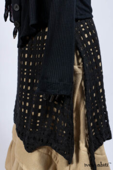 Limited Edition Coulson Cardigan in Signature Black Ribbed Knit; Clotaire Sash in Riverside Floral Silk Chiffon; Bedloe Frock in Mansard Roof Open Woolen Weave; Everett Frock in Uptown Washed Weave.