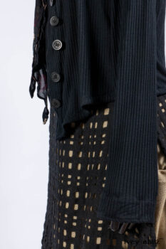 Limited Edition Coulson Cardigan in Signature Black Ribbed Knit; Clotaire Sash in Riverside Floral Silk Chiffon; Bedloe Frock in Mansard Roof Open Woolen Weave; Everett Frock in Uptown Washed Weave.