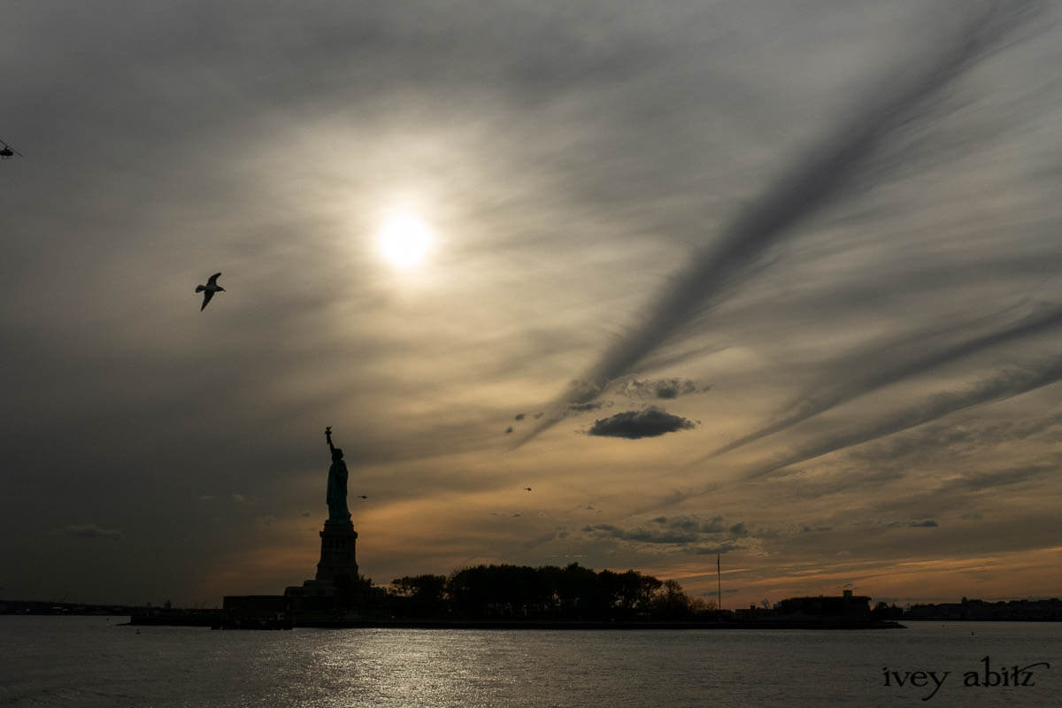 New York Harbor Statue of Liberty at sunset