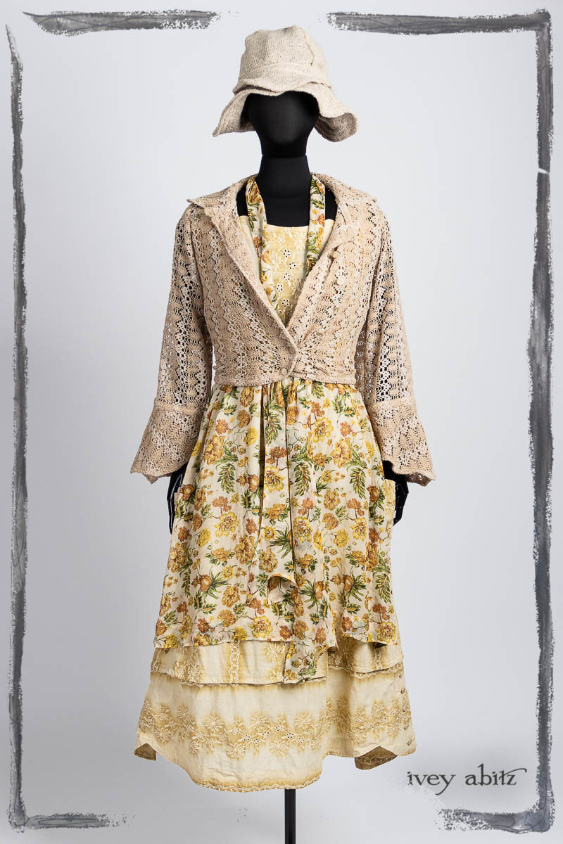 Crest Jacket in High Tea Soft Lace Knit; Harrison Frock in High Tea Embroidered Voile; Ettienne Frock in Marigold Floral Silk Chiffon; Ettienne Sash in Marigold Floral Silk Chiffon; Hapgood Hat in Beach Cottage Soft Spun Weave. Bespoke clothing by Ivey Abitz.