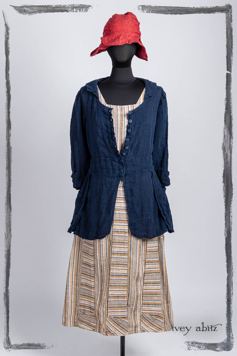 Campanella Shirt Jacket in Bastille Blue Washed Crinkled Weave; Campanella Frock in Primary Stripe Weave; Hapgood Hat in Poppy Washed Linen. Bespoke clothing by Ivey Abitz.