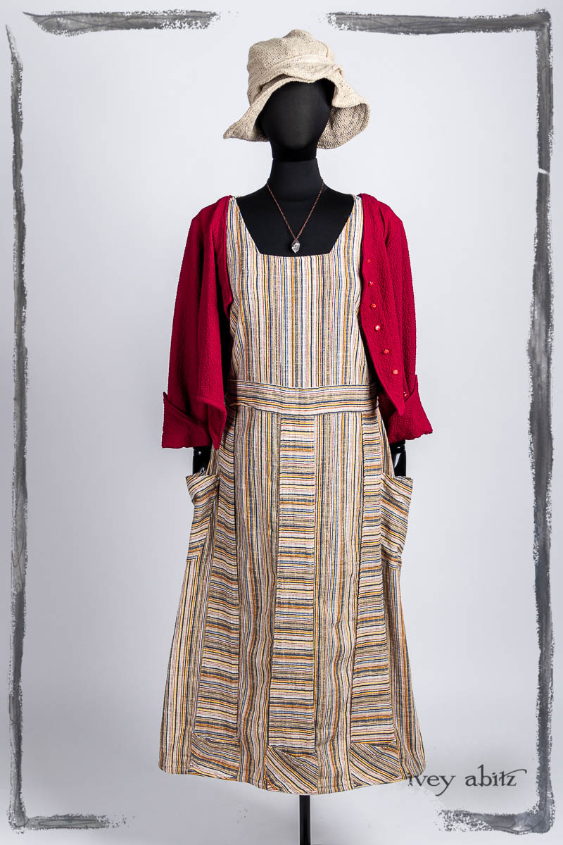 Liberté Jacket in Poppy Puckered Knit; Campanella Frock in Primary Stripe Weave; Hapgood Hat in Beach Cottage Soft Spun Weave; Nouvelle Necklace. Bespoke clothing by Ivey Abitz.