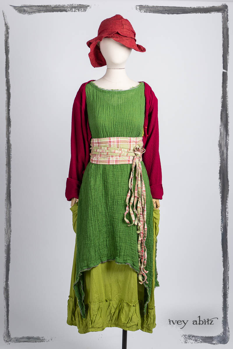 Liberté Jacket in Poppy Puckered Knit; Porte Cochere Sash in Plucky Plaid; Limited Edition Wildefield Frock in Plucky Washed Crinkled Weave; Gabled Frock in Plucky Washed Batiste; Hapgood Hat in Poppy Washed Linen. Bespoke clothing by Ivey Abitz.