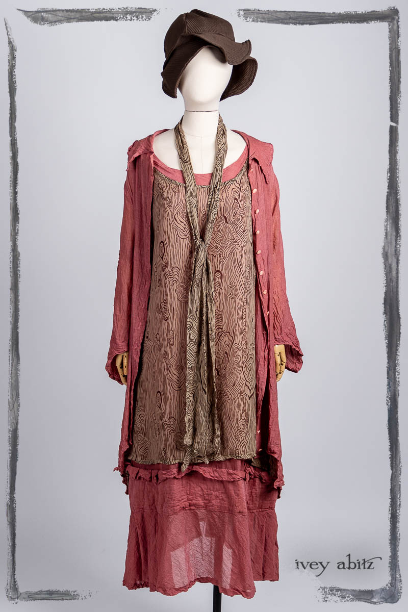 River Frock in Faux Bois Silk Chiffon; Blanchefleur Sash in Faux Bois Silk Chiffon; Chittister Duster Coat in Parisienne Rose Washed Voile; Hudson Frock in Parisienne Rose Washed Voile; Hapgood Hat in Clapboard Cottage Ribbed Weave. Bespoke clothing by Ivey Abitz.