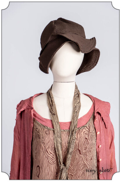 River Frock in Faux Bois Silk Chiffon; Blanchefleur Sash in Faux Bois Silk Chiffon; Chittister Duster Coat in Parisienne Rose Washed Voile; Hudson Frock in Parisienne Rose Washed Voile; Hapgood Hat in Clapboard Cottage Ribbed Weave. Bespoke clothing by Ivey Abitz.