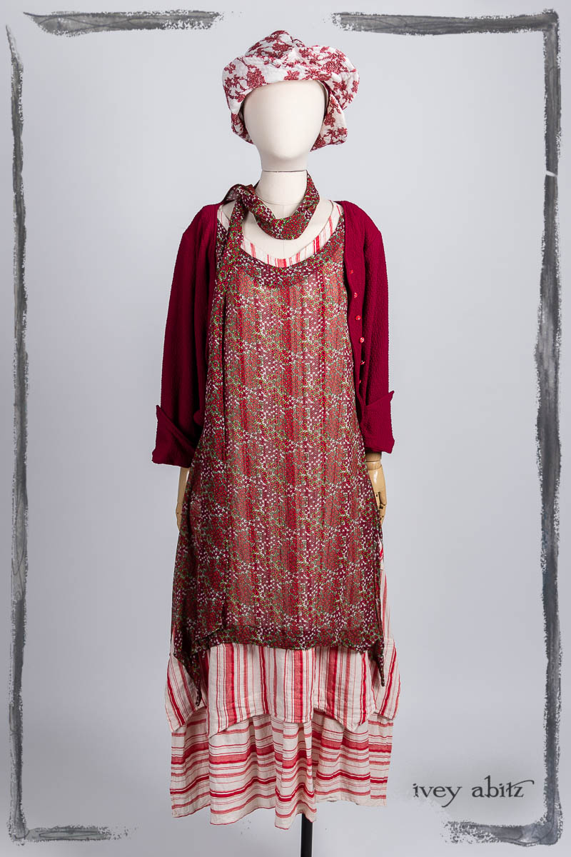 Liberté Jacket in Poppy Puckered Knit; Bedloe Frock in Poppy Floral SIlk Chiffon; Blanchefleur Sash in Poppy Floral Silk Chiffon; Liberté Frock in Poppy Variegated Raised Stripe; Hapgood Hat in Poppy Embroidered Hat Weave; Nouvelle Necklace. Bespoke clothing by Ivey Abitz.