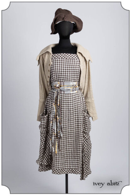 Meriwether Frock in Clapboard Cottage Woven Check; Porte Cochere Sash in Clapboard Cottage Soft Plaid; Furtherafield Jacket in Beach Cottage Soft Spun Weave; Hapgood Hat in Clapboard Cottage Ribbed Weave. Bespoke clothing by Ivey Abitz.
