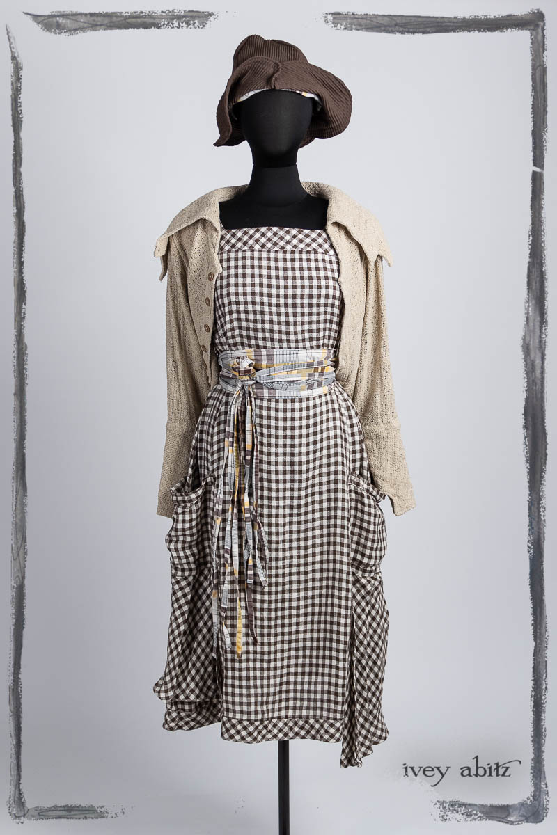 Meriwether Frock in Clapboard Cottage Woven Check; Porte Cochere Sash in Clapboard Cottage Soft Plaid; Furtherafield Jacket in Beach Cottage Soft Spun Weave; Hapgood Hat in Clapboard Cottage Ribbed Weave. Bespoke clothing by Ivey Abitz.