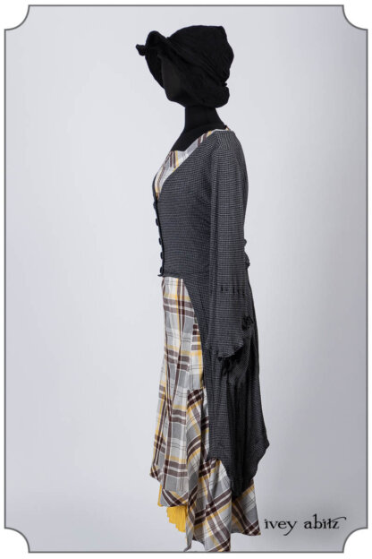 Highbridge Duster Coat in Grey Gardens Stripe and Ribbed Knit; Meriwether Frock in Clapboard Cottage Washed Plaid; Hapgood Hat in Noir Puckered Knit; Essentielle Frock in Marigold Plant Based Knit. Bespoke clothing by Ivey Abitz.