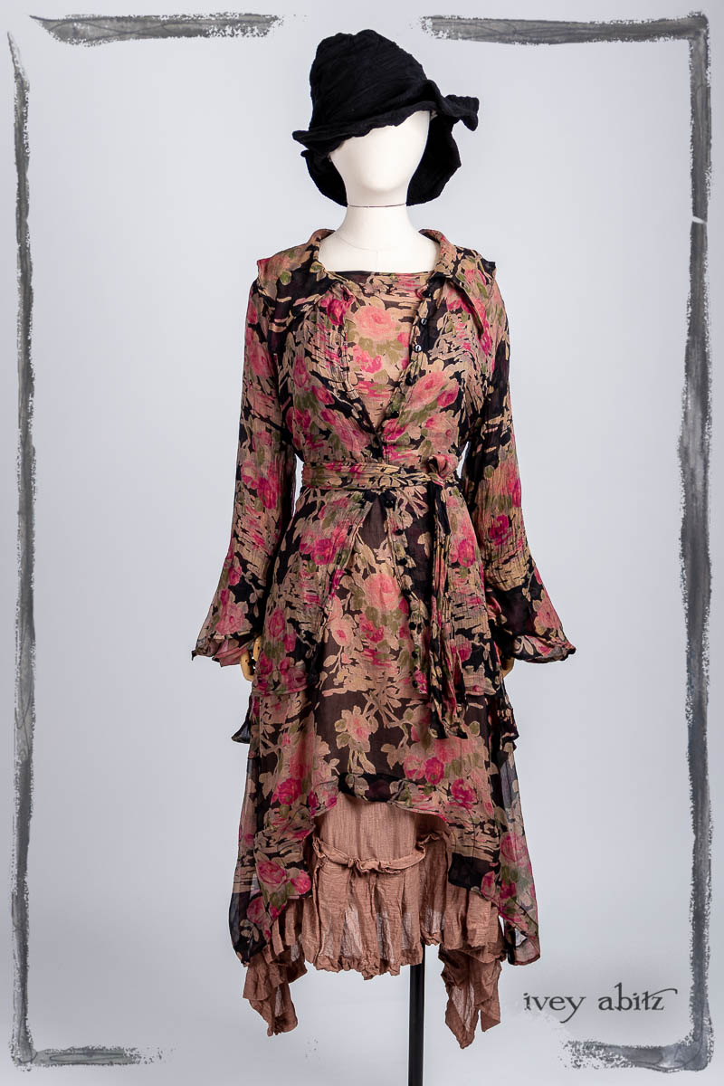 Chittister Shirt Jacket in Rose and Noir Nouveau Floral Silk Chiffon; Chittister Dress in Rose and Noir Floral Silk Chiffon; Fairholme Frock in Blush Washed Voile; Hapgood Hat in Noir Puckered Knit. Bespoke clothing by Ivey Abitz.