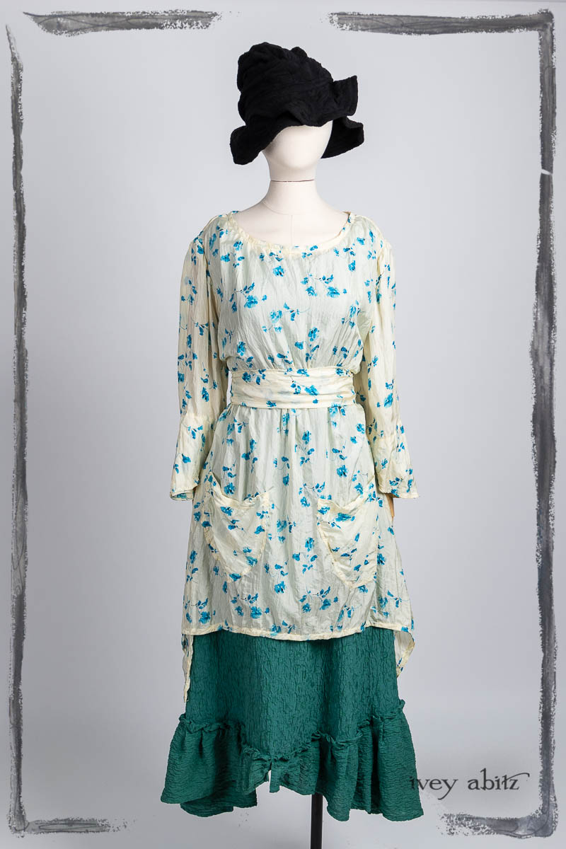 Delphine Dress in Summer Veranda Floral Crushed Silk; Tilbrook Frock in Veranda Puckered Washed Silk; Hapgood Hat in Noir Puckered Knit. Bespoke clothing by Ivey Abitz.