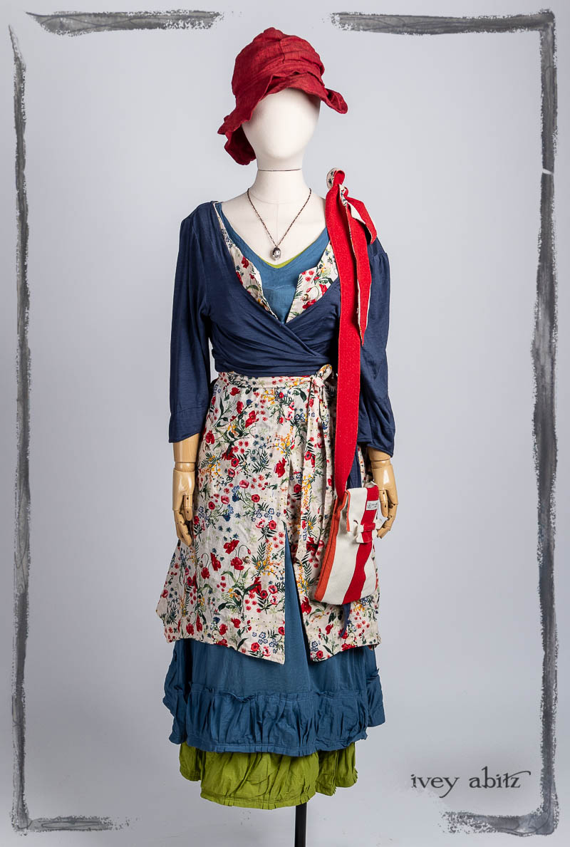 Vallonné Jacket in Bluebell Washed Silk Jersey Knit; Ellis Frock in Poppy Garden Weave; Gabled Frock in Bluebell Washed Batiste; Gabled Frock in Plucky Washed Batiste; Voyage Satchel in Poppy Stripe Soft Canvas; Hapgood Hat in Poppy Washed Linen; Nouvelle Necklace. Bespoke clothing by Ivey Abitz.