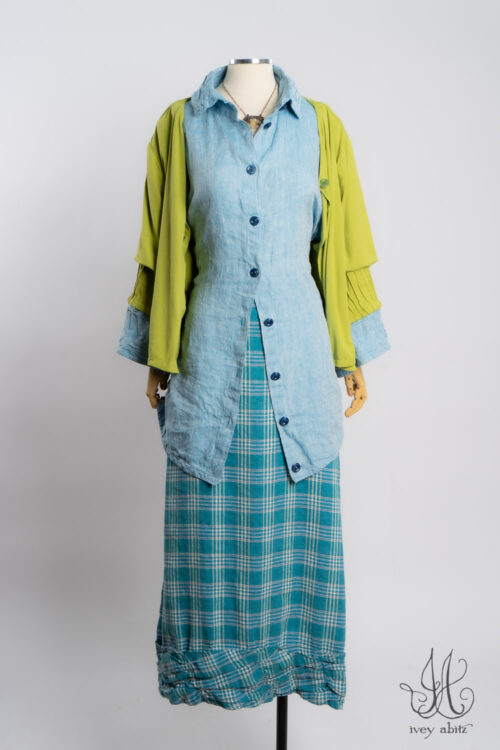 Tollie Shirt in Ice Blue Washed Weave; Lydia Jacket in Avocado Soft and Stretchy Knit; Fitzgerald Skirt in Turquoise Woven Plaid; Heirloom Necklace.