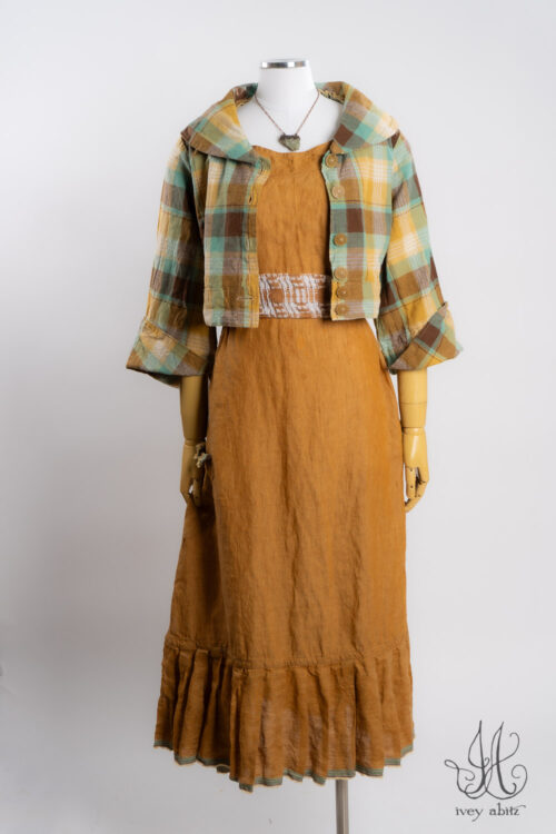 Beacon Jacket in Sea Foam Plaid; Rennie Frock in Ripe Apricot Washed Weave; Rennie Sash in Ripe Apricot Embroidered Weave; Heirloom Necklace.