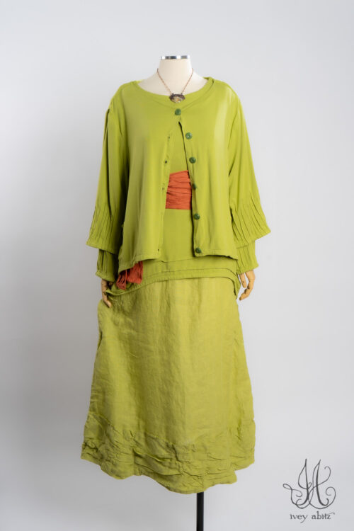 Lydia Jacket in Avocado Soft and Stretchy Knit; Tollie Sash in Canteloupe Washed Weave; Lydia Overlay in Avocado Soft and Stretchy Knit; Fitzgerald Frock in Avocado Washed Weave; Heirloom Necklace.