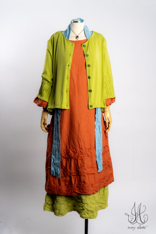 Lydia Jacket in Avocado Soft and Stretchy Knit; Tollie Dress in Canteloupe Washed Weave; Tollie Sash in Ice Blue Washed Weave; Fitzgerald Frock in Avodcado Washed Weave; Nouvelle Necklace.