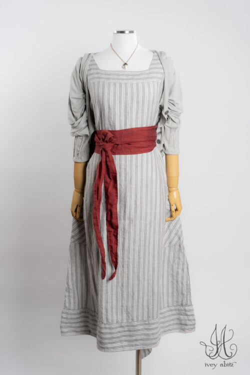 Merrily Frock in Raindrop Stripe Washed Weave; Eleanora Sash in Casual Red Washed Weave; Mercer Cardigan in Raindrop Soft and Stretchy Knit; Nouvelle Necklace.