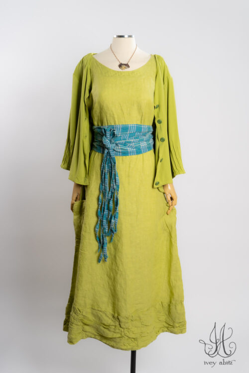 Lydia Jacket in Avocado Soft and Stretchy Knit; Fitzgerald Frock in Avocado Washed Weave; Porte Cochere Sash in Turquoise Woven Plaid; Heirloom Necklace.