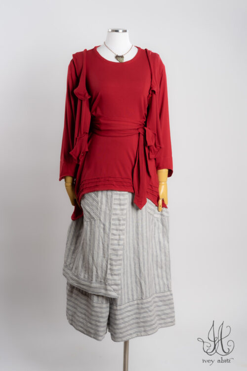 Ans Jacket in Casual Red Soft and Stretchy Knit; Lydia Overlay in Casual Red Soft and Stretchy Knit; Ans Sash in Casual Red Soft and Stretchy Knit; Wright Culottes in Raindrop Stripe Washed Weave; Heirloom Necklace.