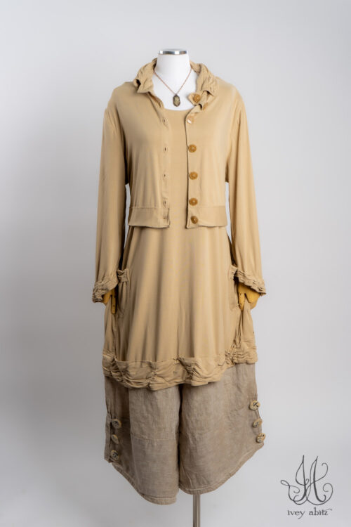 Bertie Jacket in Oyster in Soft and Stretchy Knit; Tollie Top in Oyster in Soft and Stretchy Knit; Viv Trousers in Oyster Washed Weave; Heirloom Necklace.