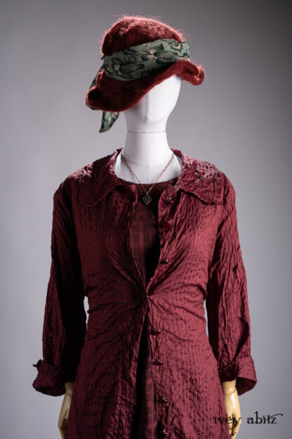 Chittister Duster Coat in Crimson Sky Washed Stripe Silk; Chittister Frock in Crimson Sky Plaid and Sateen Chiffon; Fairholme Frock in Valley Sky Softest Charmeuse; Hapgood Hat in Crimson Sky Mohair Hat and Scarf Knit; Ettienne Sash in Valley Sky Floral Silk Chiffon; Nouvelle Necklace.