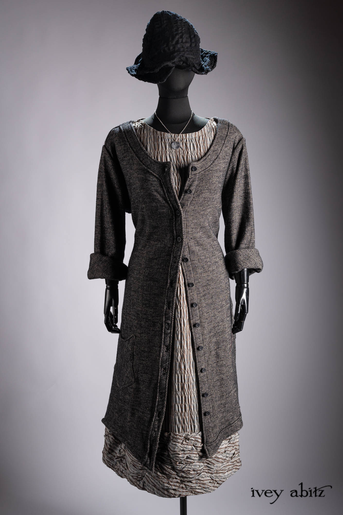 Vanetten Duster Coat in River Fog Ethereal Soft Voile; Liberte Frock in Riverbank Floral Woven Weave; Baedeker Scarf in Crimson Sky Floral Silk Velvet; Cilla Slip Frock in Bark Silky Knit; Hapgood Hat in Bark Washed Woven Hat Weave; Heirloom Necklace.