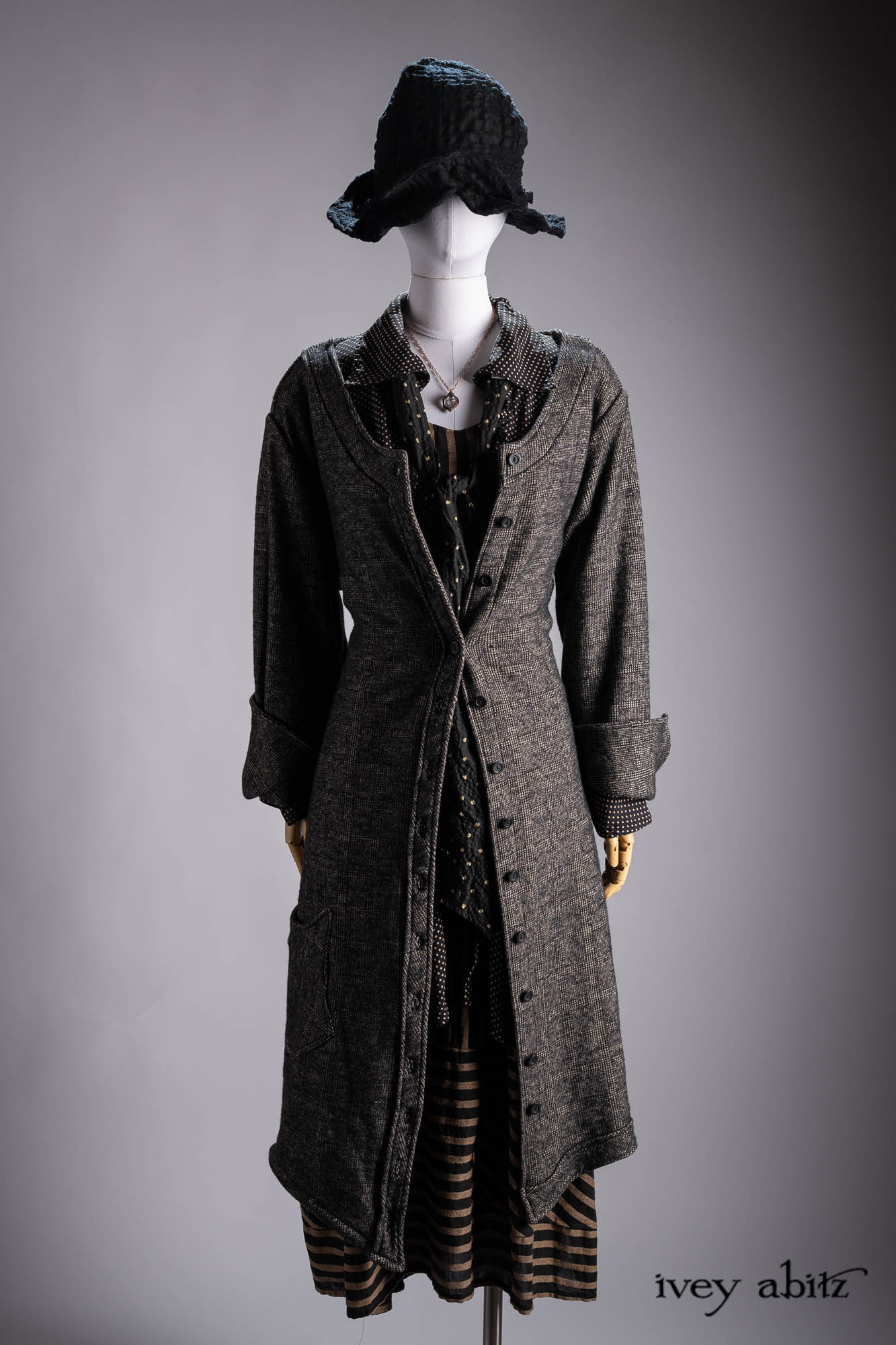 Vanetten Duster Coat in River Fog Ethereal Soft Voile; Liberte Frock in Riverbank Floral Woven Weave; Baedeker Scarf in Crimson Sky Floral Silk Velvet; Cilla Slip Frock in Bark Silky Knit; Hapgood Hat in Bark Washed Woven Hat Weave; Heirloom Necklace.