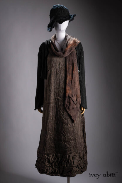 Eugenia Jacket in Mountain Mottled Ribbed Knit; Manor Frock in Bark and Mountain Striated Silk; Cilla Slip Frock in Signature Black Bamboo Silky Knit; Baedeker Scarf in Bark Mottled Mohair Hat and Scarf Weave; Hapgood Hat in Mountain Plaid Hat Weave; Nouvelle Necklace.