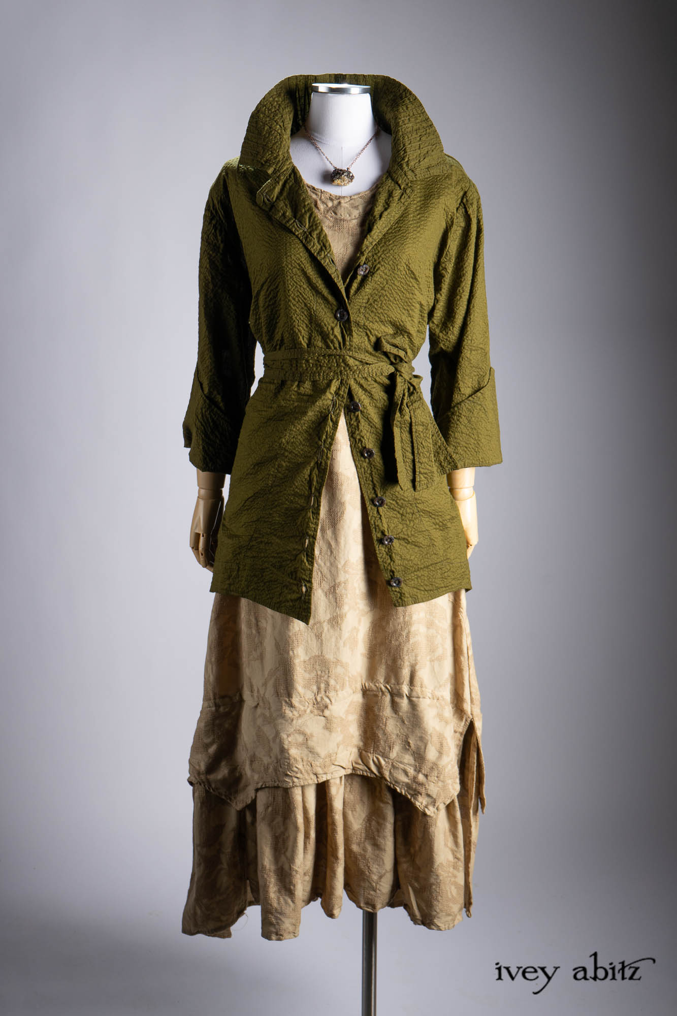 Vanetten Duster Coat in River Fog Ethereal Soft Voile; Liberte Frock in Riverbank Floral Woven Weave; Baedeker Scarf in Crimson Sky Floral Silk Velvet; Cilla Slip Frock in Bark Silky Knit; Hapgood Hat in Bark Washed Woven Hat Weave; Heirloom Necklace.