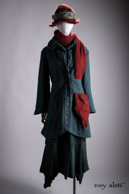 Montague Duster Coat in Valley Sky Rustic Washed Weave; Truitt Shirt Jacket in Valley Sky Three-Leaf Silk; Fairholme Frock in Valley Sky Softest Charmeuse; Hapgood Hat in Crimson Sky Mohair Hat and Scarf Knit; Ettienne Sash in Valley Sky Floral Silk Chiffon; Baedeker Scarf in Crimson Sky Mohair Hat and Scarf Knit.