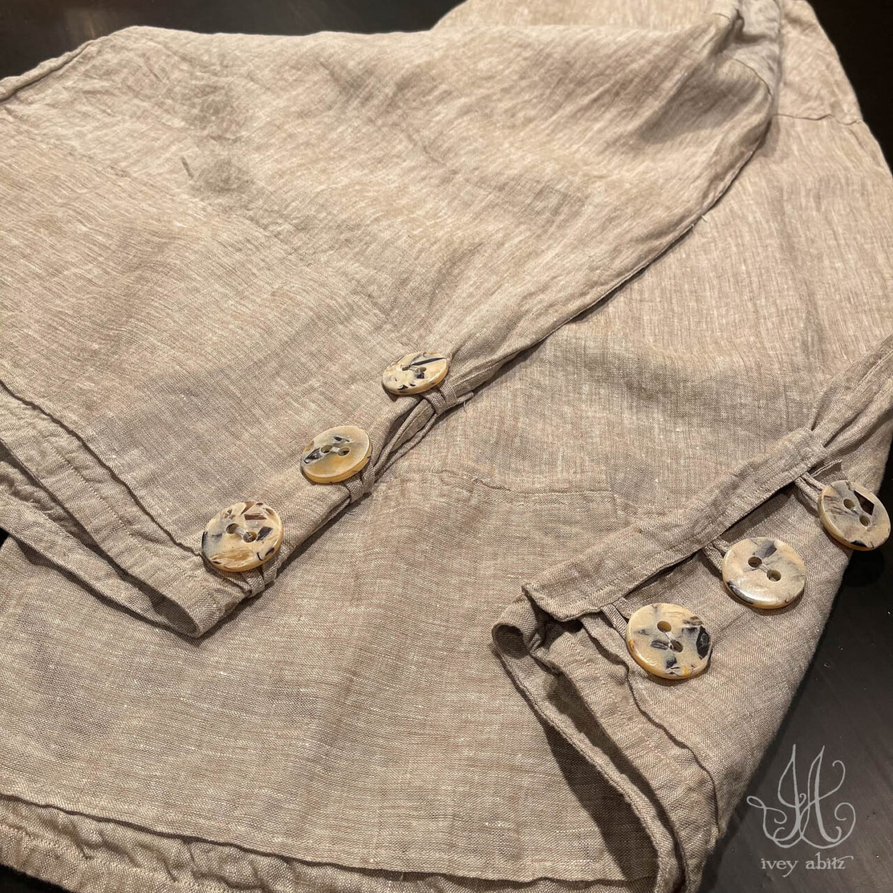 Viv Trousers getting folded before carefully being placed in their Ivey Abitz presentation box.
