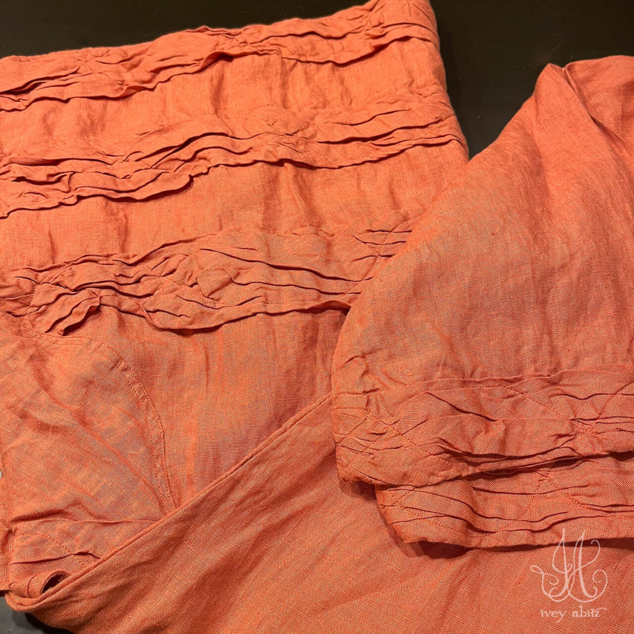 Tollie Dress getting folded up and getting ready to be shipped to its new owner.