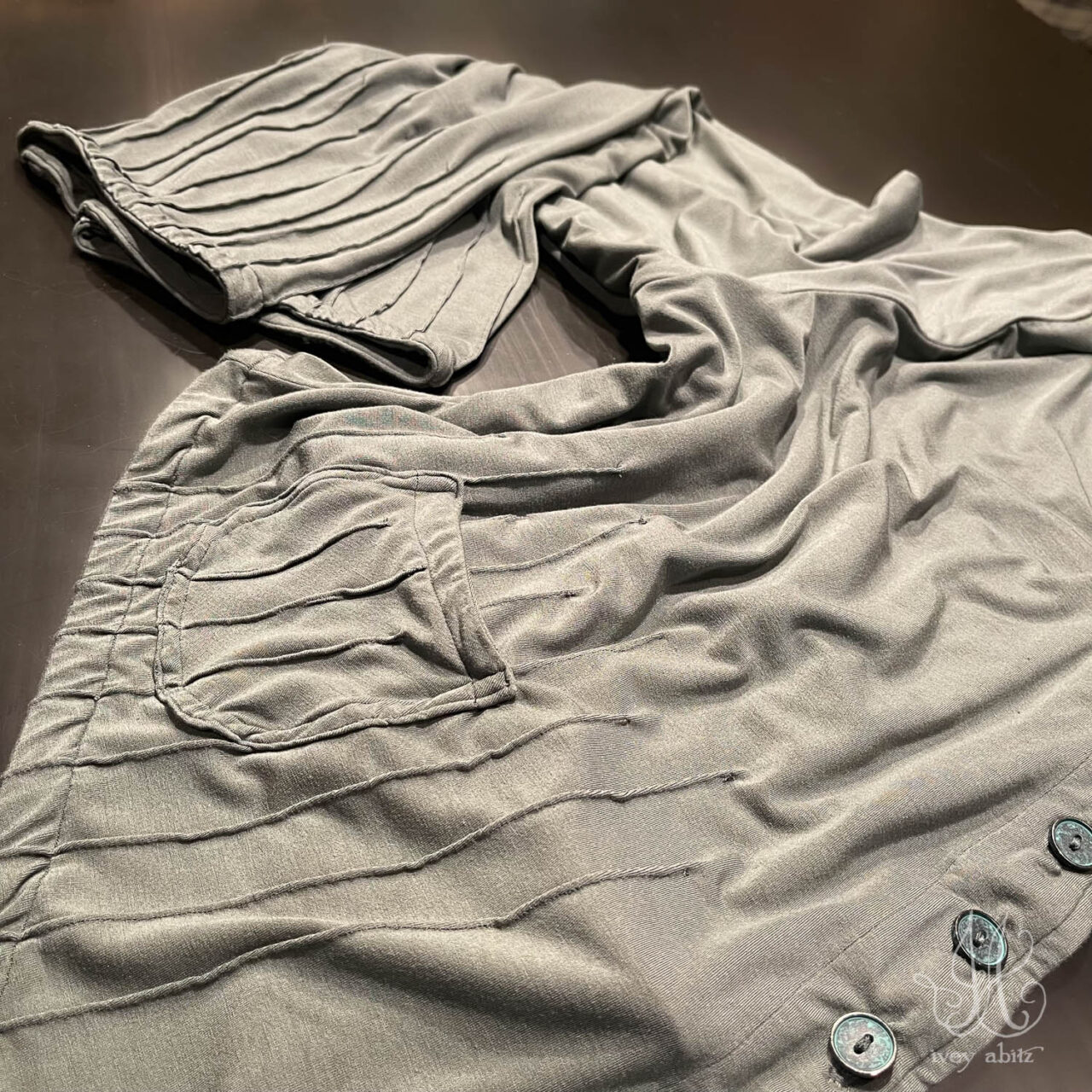 Another Mercer . It is loved because of all the intricate details. Pin tucks on the front and back, each one carefully sewn.