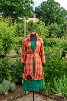 Gabled Duster Coat in Sunnyside Washed Plaid; Campanella Frock in Gracious Green Washed Crinkled Linen; Idyll Brooch in Rose Garden Silk Weaves. Ivey Abitz at Boscobel House and Gardens