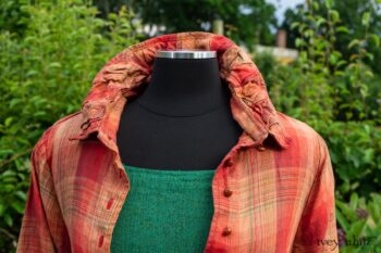 Gabled Duster Coat in Sunnyside Washed Plaid; Campanella Frock in Gracious Green Washed Crinkled Linen; Idyll Brooch in Rose Garden Silk Weaves. Ivey Abitz at Boscobel House and Gardens