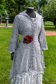 Baudelaire Duster Coat in Black and White Washed Stripe Voile; Blanchefleur Dress in Black and White Seashell Voile; Cilla Slip Frock in Peony Soft Ribbed Knit; Idyll Brooch in Rose Garden Silk Weaves. Ivey Abitz at Boscobel House and Gardens