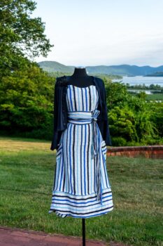 Harrison Frock in Hudson Blue Embroidered Stripe Voile; Porte Cochere Sash in Hudson Blue Embroidered Stripe Voile; Cilla Slip Frock in Peony Soft Ribbed Knit; Crest Jacket in Hudson Blue Soft Ribbed Knit; Soutache Brooch in Black Weaves. Ivey Abitz at Boscobel House and Gardens