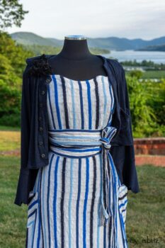 Harrison Frock in Hudson Blue Embroidered Stripe Voile; Porte Cochere Sash in Hudson Blue Embroidered Stripe Voile; Cilla Slip Frock in Peony Soft Ribbed Knit; Crest Jacket in Hudson Blue Soft Ribbed Knit; Soutache Brooch in Black Weaves. Ivey Abitz at Boscobel House and Gardens